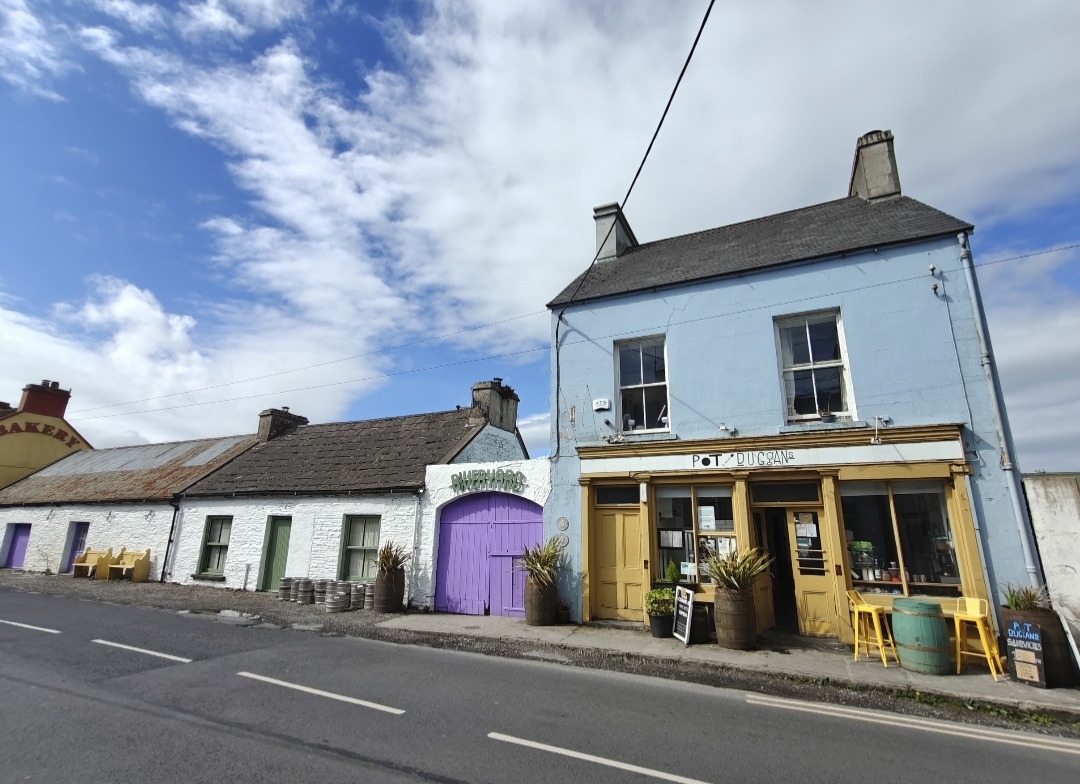 Colourful shopfronts in Ennistymon, County Clare, including Pot Duggan's